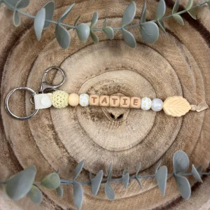 Porte-clé fleur printanière et crème