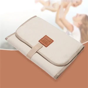Matelas à langer bébé à poche